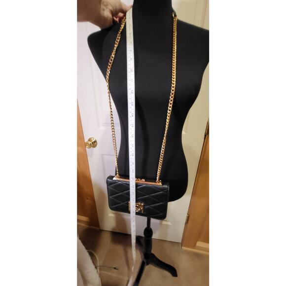 BeBe Crossbody purse, black, long gold color strap, divided sections. - Picture 4 of 13